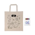 A beige calico bag with sea-themed outlines and a pack of colorful crayons. The bag has a logo.