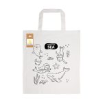 A cream cotton bag featuring whimsical sea-themed illustrations, including sea creatures and children, with a logo.