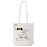 A white tote bag featuring a line drawing of an Easter bunny surrounded by decorated eggs. It has a logo.
