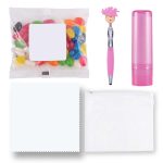 An assortment of products including colorful jelly beans, a pink pen, a pink lip balm container, a blank notepad, and a clear pouch.