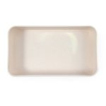 A rectangular lunch box in a neutral beige color, featuring a smooth, textured interior with rounded edges.