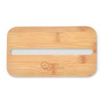 A bamboo lunch box lid with a phone holder slot and a logo. The lid has a smooth finish and rounded edges.
