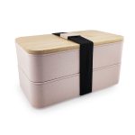 A stacked pink lunch box with a bamboo lid, secured with a black strap, featuring a minimalist design.