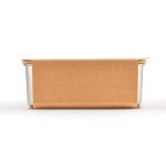 A lunch box with a sleek metal container wrapped in a brown kraft paper sleeve.