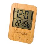 A digital weather station featuring a bamboo frame, displaying the time, temperature, and humidity levels.