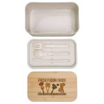 A beige lunch box with a bamboo lid, containing utensils including a fork and spoon. It features a logo.