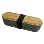 A gray utility case with a wooden lid featuring a ruler design, secured by a black strap.