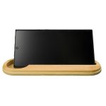 A sleek bamboo stand holds a tablet in an upright position, showcasing the minimalist design.