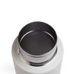 A drink bottle with a sleek design and stainless steel opening. The interior features a smooth, polished finish.