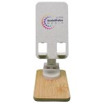 A phone stand featuring a natural bamboo base and a light-colored, textured top with a logo.