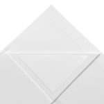 A large white magnetic gift box with a triangular closure flap. The box features a logo.