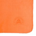 An orange fleece blanket featuring a logo in the corner. The fabric appears soft and warm.