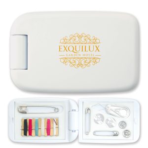 A white sewing kit containing threads, buttons, safety pins, and a needle, with a logo on the exterior.