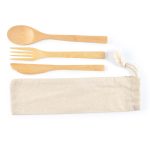 A bamboo cutlery set including a spoon, fork, and knife, all housed in a natural calico pouch.