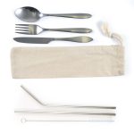 A stainless steel cutlery and straw set in a calico pouch featuring a fork, knife, spoon, and two straws.