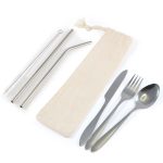 A stainless steel cutlery and straw set in a calico pouch, featuring a fork, knife, spoon, and two straws.