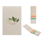 A tan sticky note pad with a logo, featuring colorful sticky flags in pink, orange, yellow, and green.