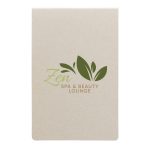 A cream-colored sticky note pad featuring a green logo with leaves and the text "Zen Spa & Beauty Lounge."