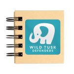A tan sticky note pad with a spiral binding featuring an elephant logo on a turquoise background.