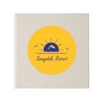 A circular logo featuring a dolphin, sun, and waves, set against a yellow background. The logo includes branding.