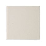 A cream-coloured note block with a plain, textured surface. It features a logo on one side.