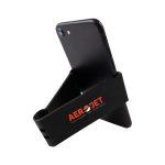A black phone stand featuring a logo, supporting a smartphone in an upright position.