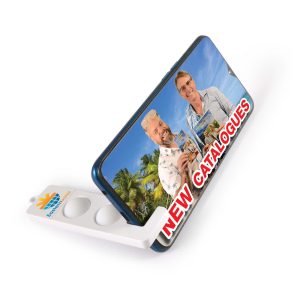 A phone stand in white with a colorful image, displaying two people holding products against a tropical background.