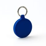 A blue keychain with a circular design, featuring a metal keyring attachment.