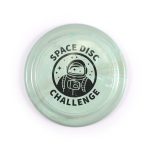 A flying disc featuring a marbled green design with the text "SPACE DISC CHALLENGE" and an illustration of an astronaut.