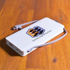 A white power bank with a gray strap and multiple ports, featuring a logo on its surface.