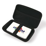 A white power bank inside a black zippered case, featuring a logo on the top.