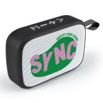 A black portable speaker with mesh design and a colourful logo, featuring a carrying strap.
