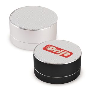 A Bluetooth speaker set in white and black, featuring a metal grille and branding on the top.