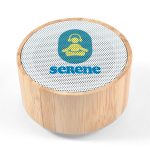 A bamboo Bluetooth speaker with a round shape and a mesh top featuring a logo.