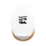A white oval speaker with a wooden base and a logo featuring a palm tree and the text "Tropicana Beach Club."