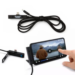 A black charging cable with connectors, displayed alongside a smartphone showing video playback and a hand interacting with the screen.