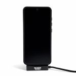 A black promotional phone stand featuring a charging cable, designed for mobile devices.