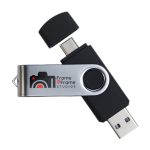 A black and silver swivel USB flash drive with dual connectors and a logo on the side.