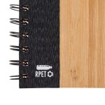 A black and bamboo spiral A5 notebook featuring a textured cover and a logo.