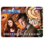 A promotional mouse pad featuring characters from Doctor Who, with a vibrant design and colourful background.