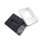 A silver tin with a PVC window, featuring a foam insert and contents visible through the window.