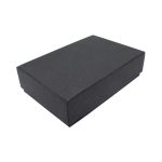 A black gift box with a two-part design, featuring a plain, smooth exterior.