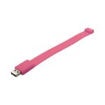 A pink silicone wristband with a USB connector at one end and a smooth, flexible design.
