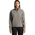 A faded grey half-zip jacket with a relaxed fit and long sleeves, featuring a small collar and logo.